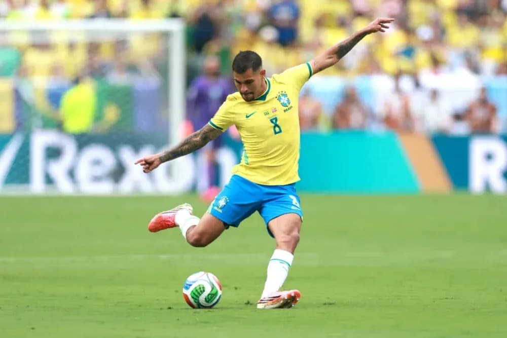 Brazilian player kicking soccer ball during match Brazilian player kicking soccer ball during match