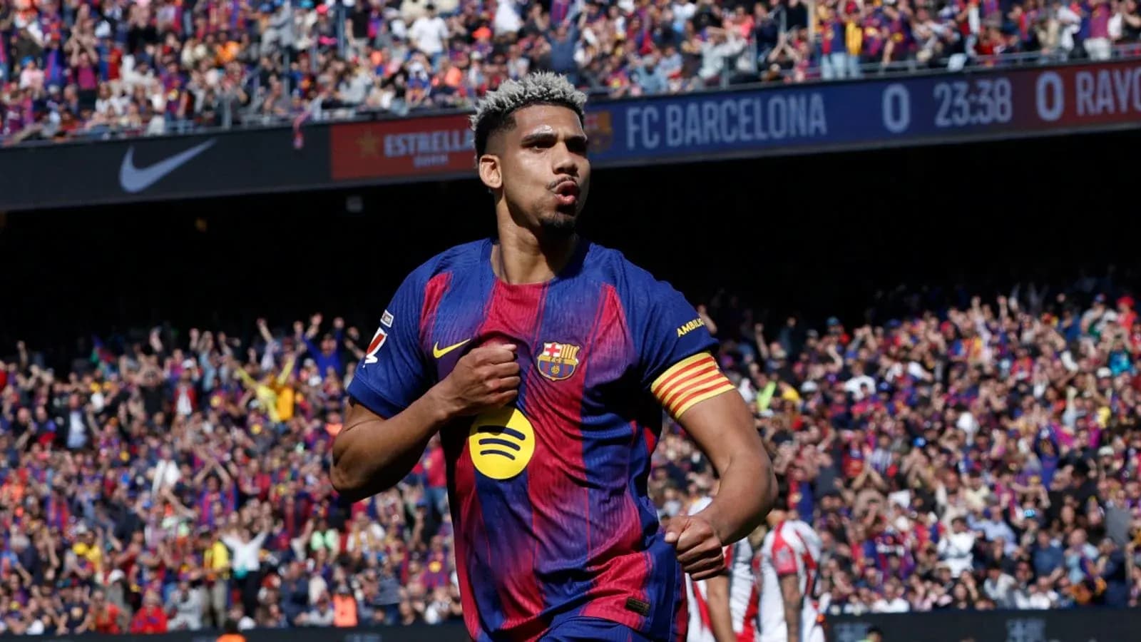 Barcelona player celebrating goal in stadium Barcelona player celebrating goal in stadium