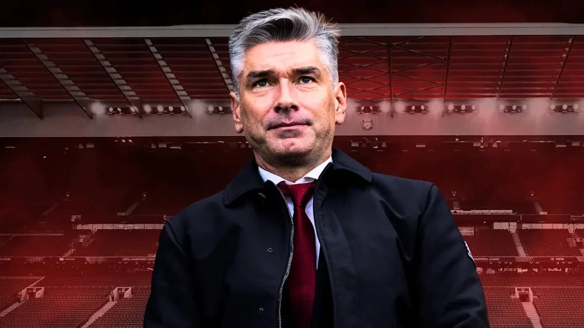 Manager standing in front of stadium backdrop Manager standing in front of stadium backdrop