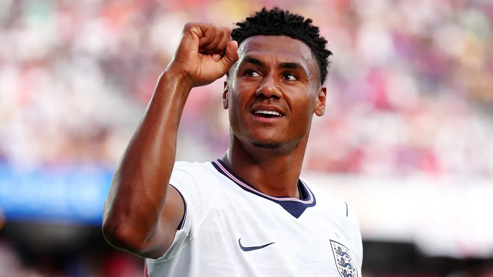 Player celebrating with fist raised during match Player celebrating with fist raised during match