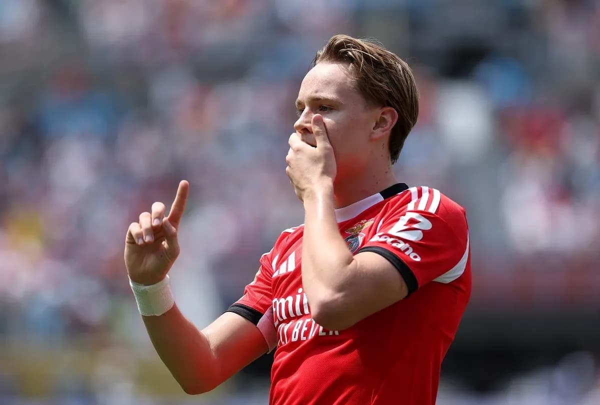 Player celebrating goal with finger raised Player celebrating goal with finger raised