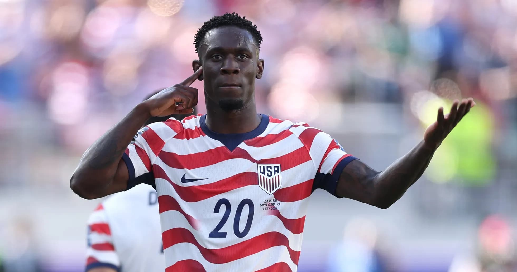 Player celebrating after scoring for USA Player celebrating after scoring for USA