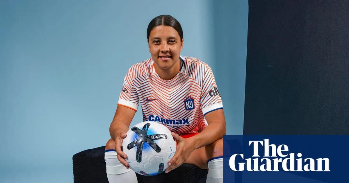 Player holding a soccer ball in studio setting Player holding a soccer ball in studio setting