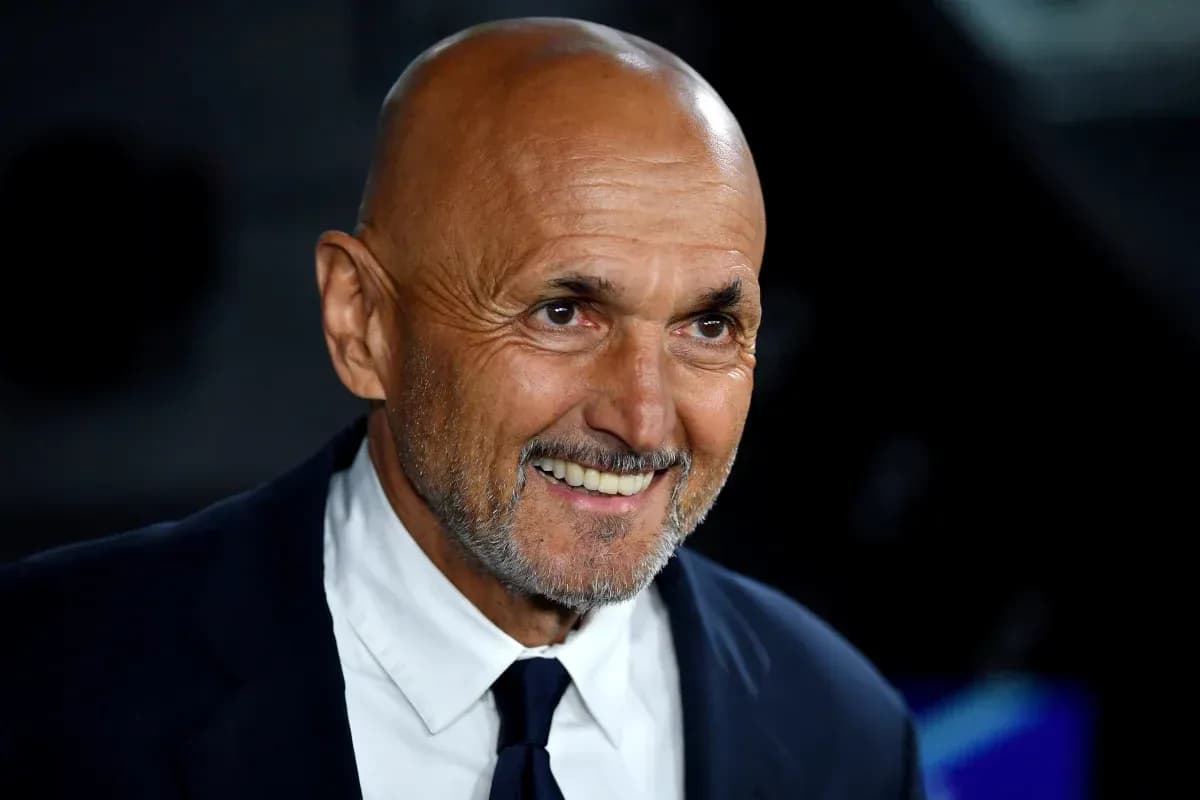 Man smiling in a suit during an event Man smiling in a suit during an event