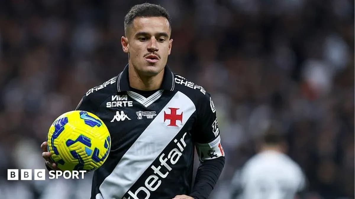 Player holding ball during a football match Player holding ball during a football match