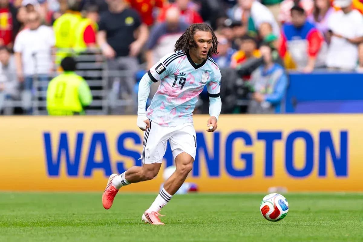 Player in colorful jersey running with soccer ball Player in colorful jersey running with soccer ball