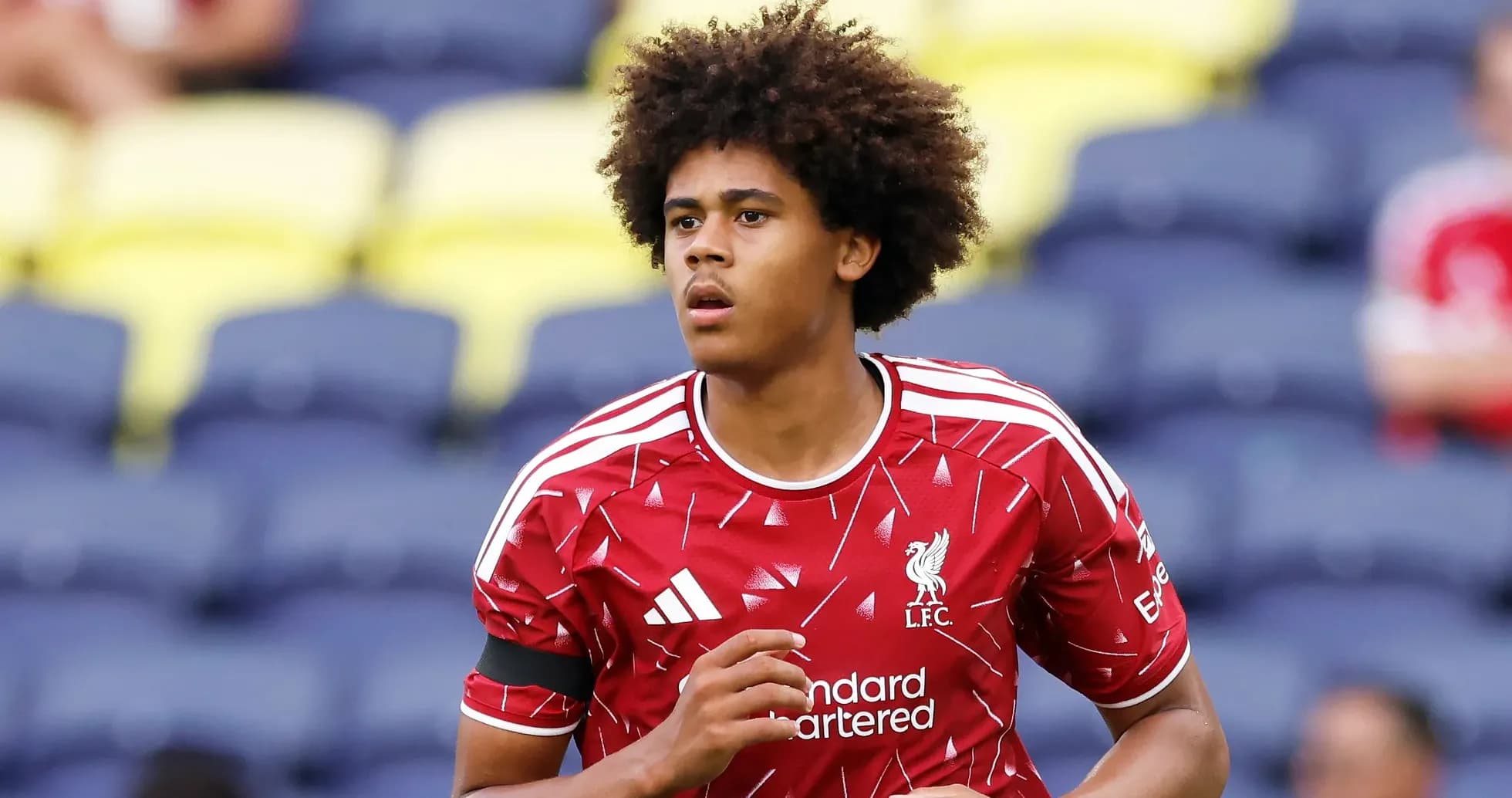 Player warming up in Liverpool jersey before match Player warming up in Liverpool jersey before match
