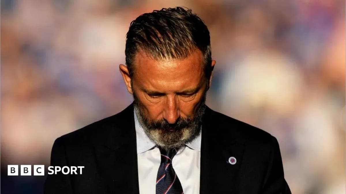 Man in suit looking down, possibly in thought Man in suit looking down, possibly in thought