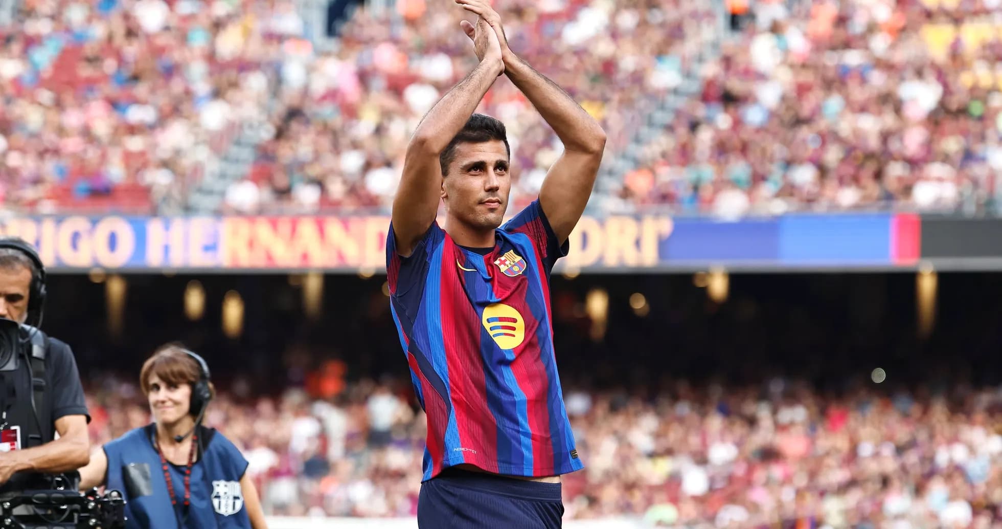 Player applauding fans at Camp Nou stadium Player applauding fans at Camp Nou stadium
