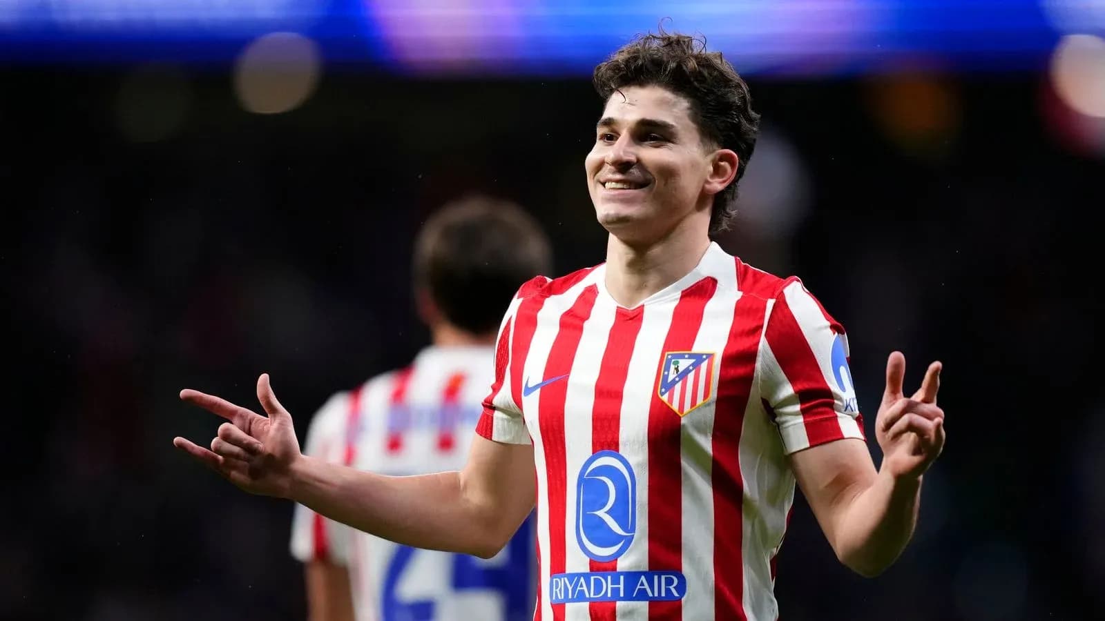 Atletico Madrid player celebrating after scoring goal Atletico Madrid player celebrating after scoring goal