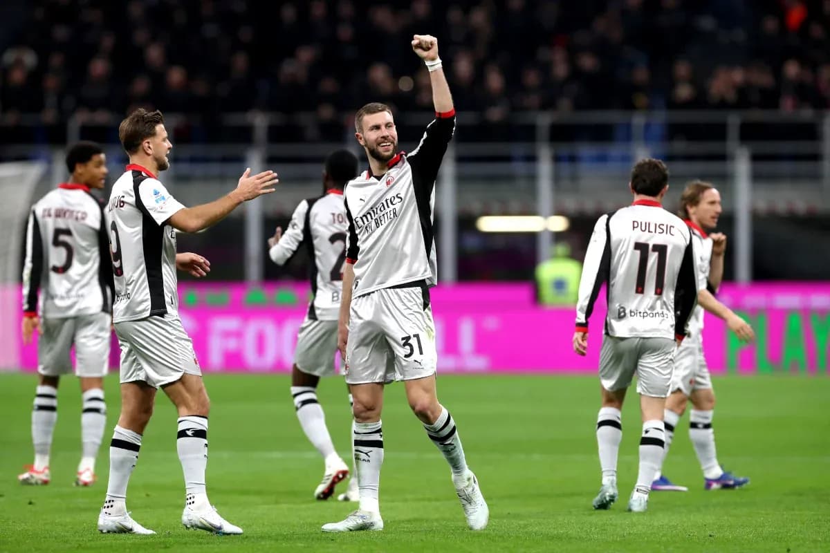 AC Milan players celebrating during Serie A match AC Milan players celebrating during Serie A match