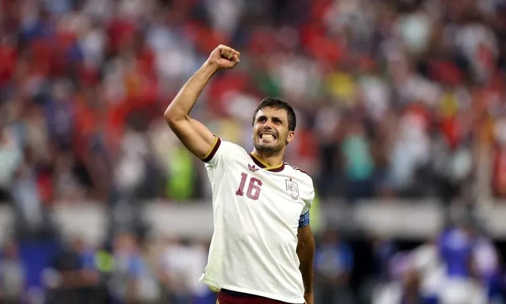 Player celebrating victory with raised fist Player celebrating victory with raised fist