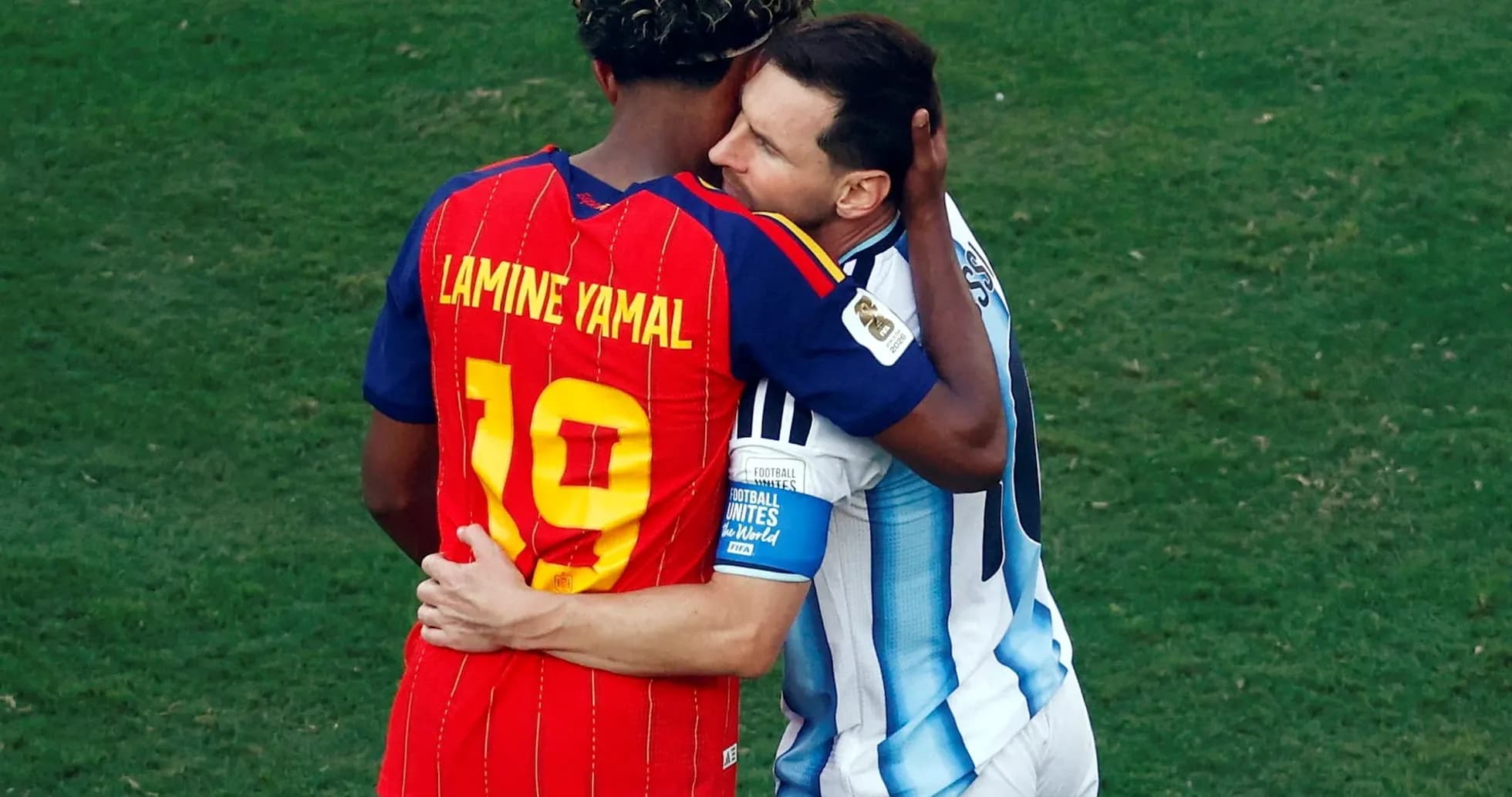 Lamine Yamal embracing Lionel Messi after match Lamine Yamal embracing Lionel Messi after match