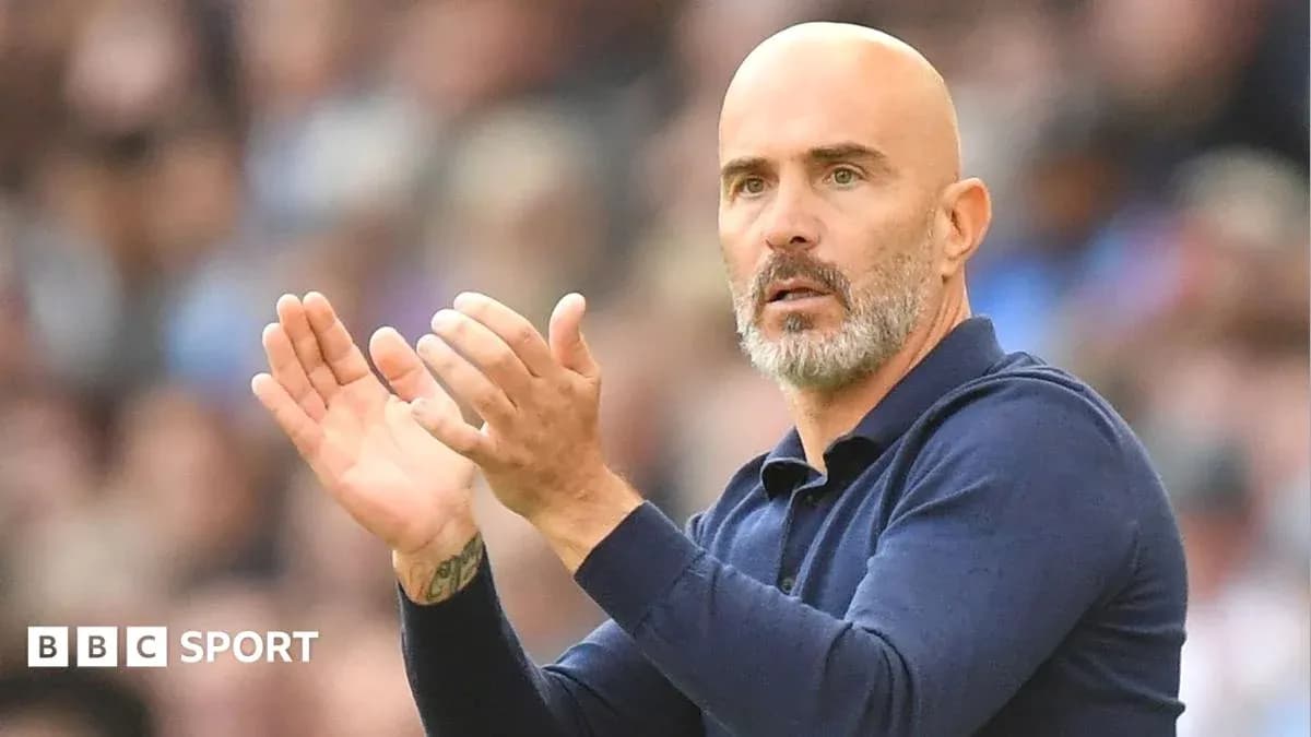 Coach gesturing and applauding during match Coach gesturing and applauding during match