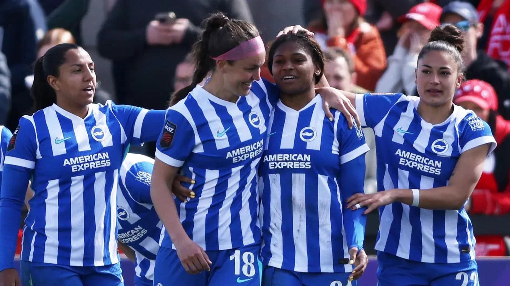 Brighton W players celebrating a goal Brighton W players celebrating a goal
