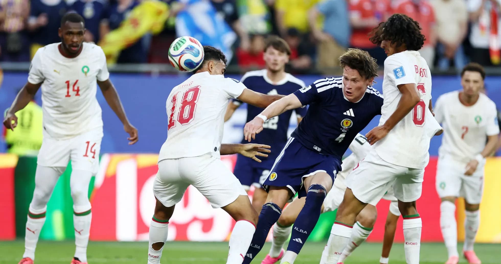 Players from Scotland and Morocco contesting the ball Players from Scotland and Morocco contesting the ball