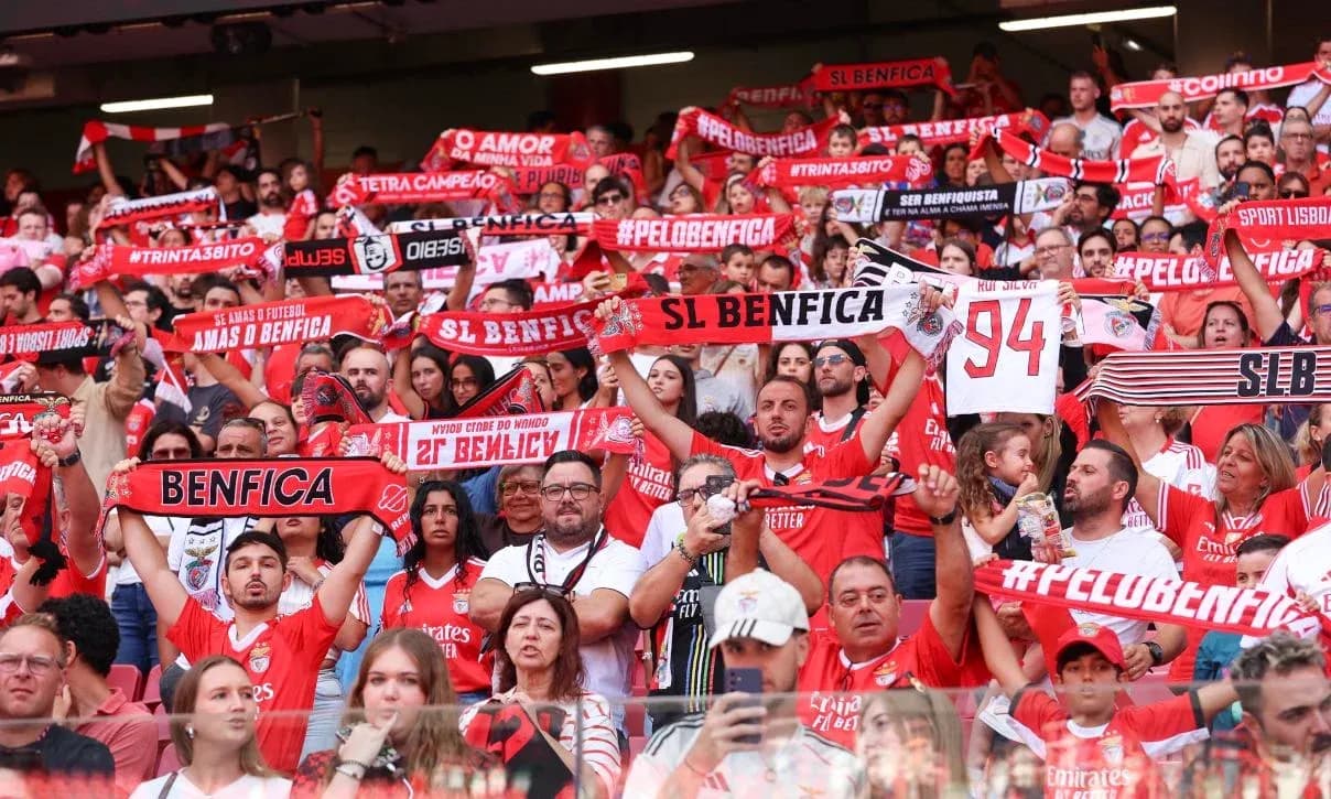 Benfica fans cheering in the stadium Benfica fans cheering in the stadium