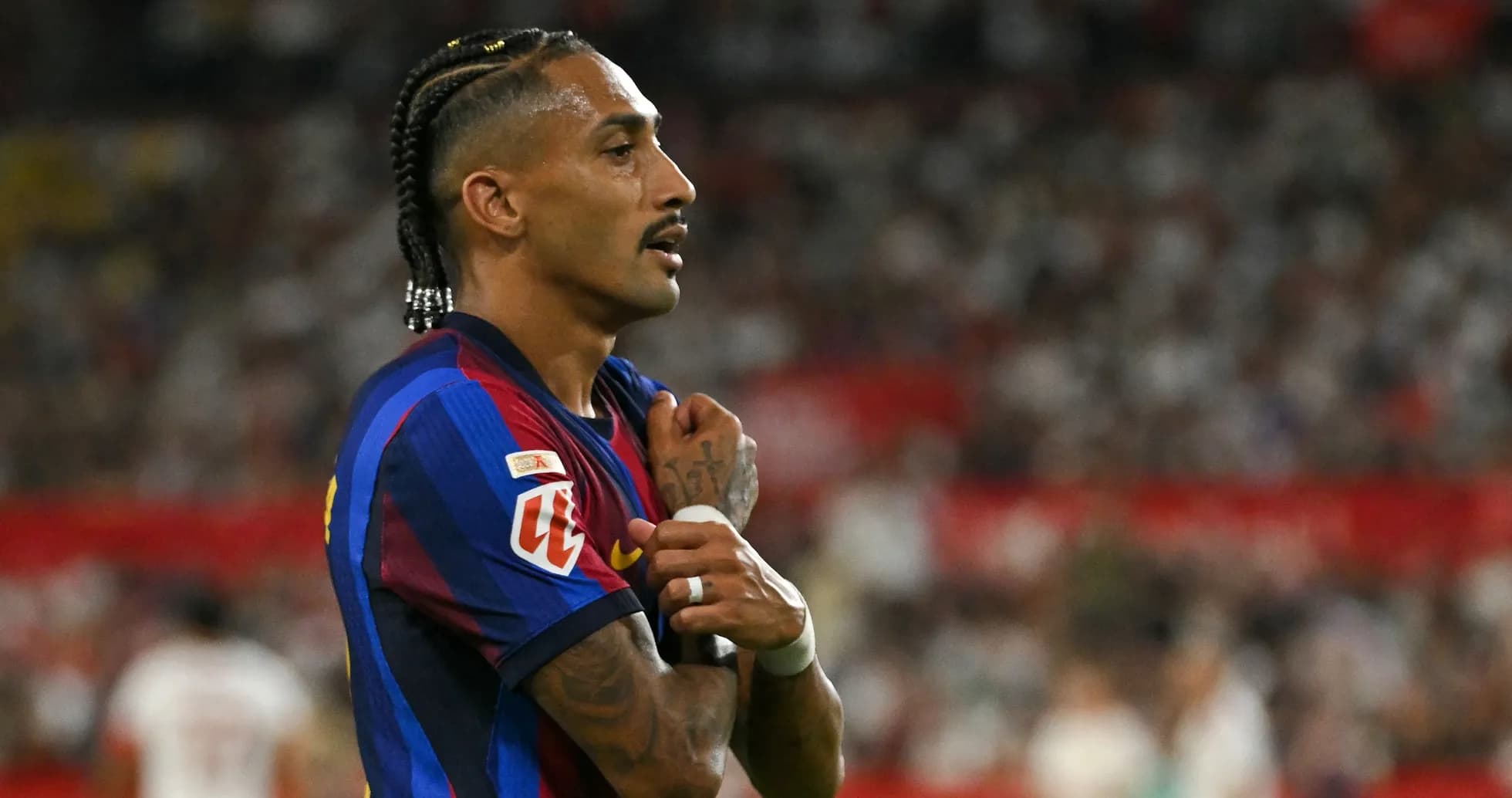 Player in FC Barcelona kit during match action Player in FC Barcelona kit during match action