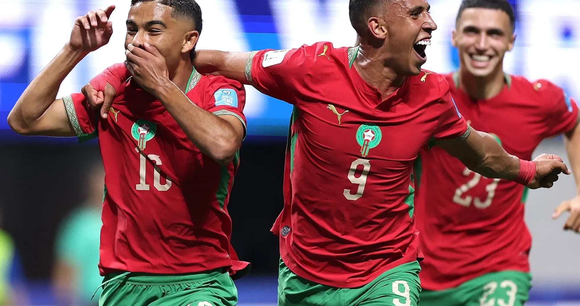 Moroccan players celebrating a goal during match Moroccan players celebrating a goal during match