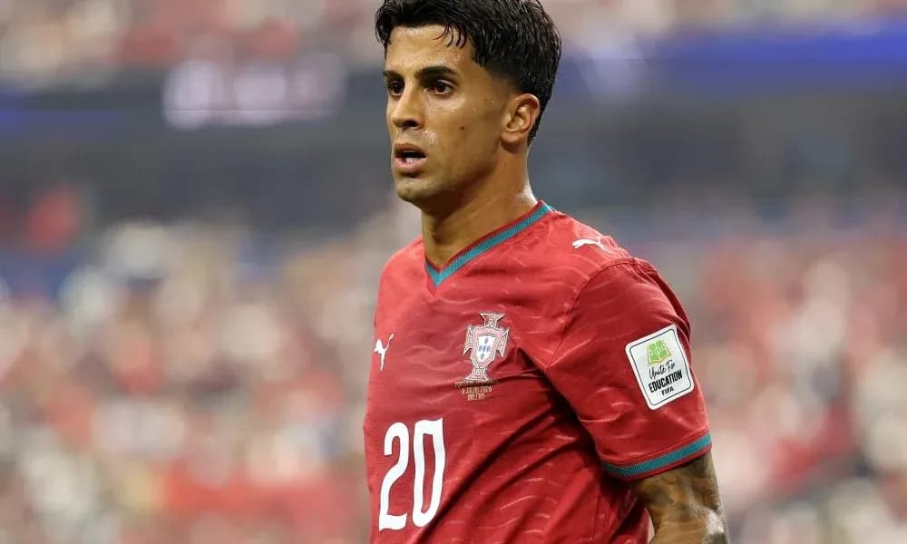 Player in red jersey during match on field Player in red jersey during match on field