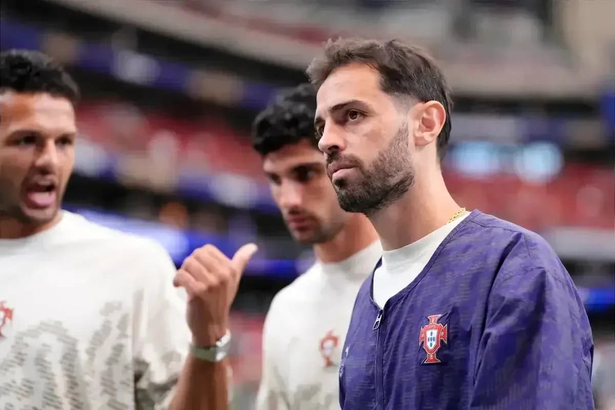 Three Portuguese players discussing before the match Three Portuguese players discussing before the match
