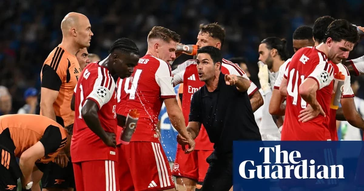 Arsenal players and coach during a match break Arsenal players and coach during a match break