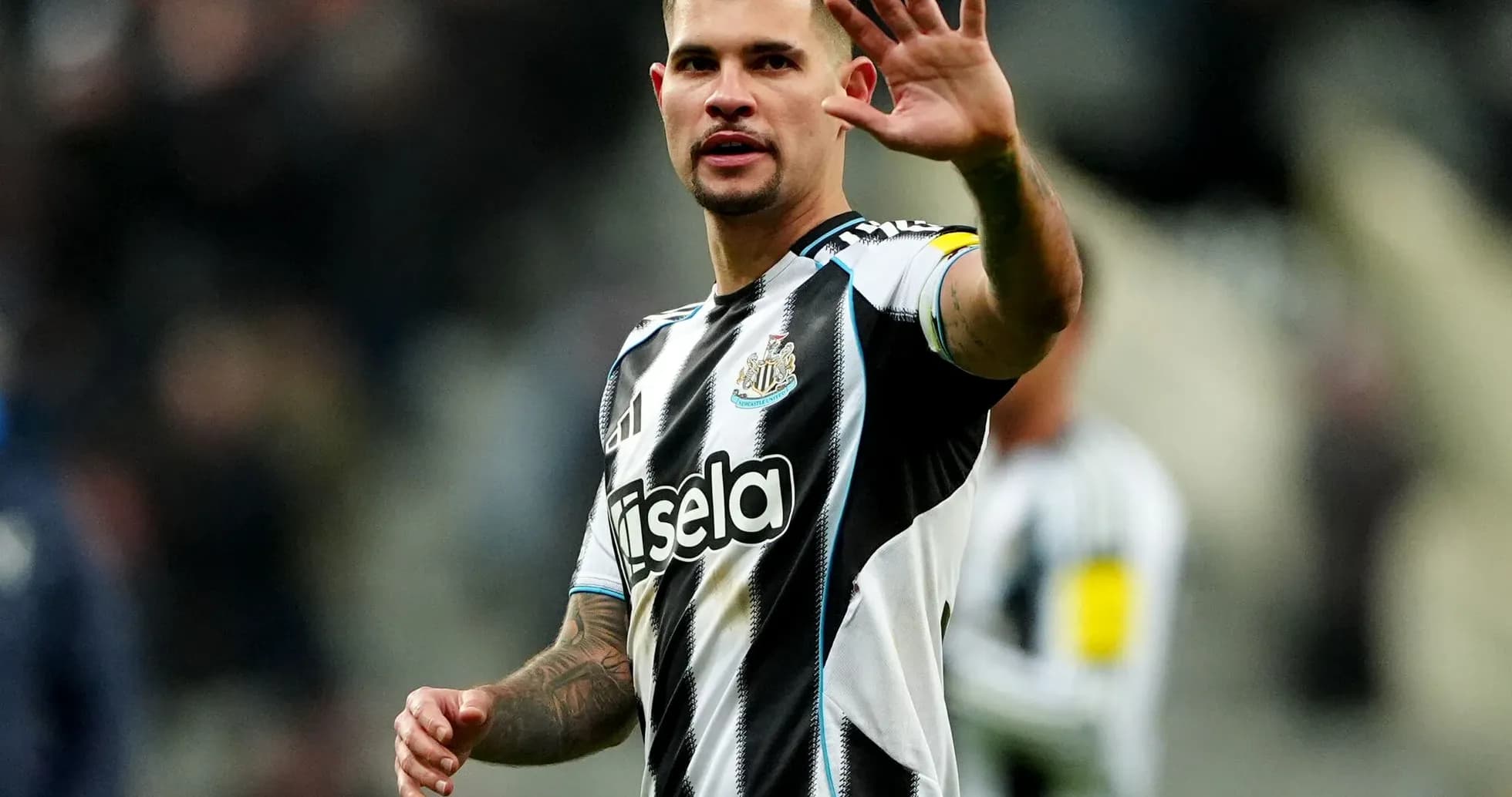 Player waving during match for Newcastle United Player waving during match for Newcastle United