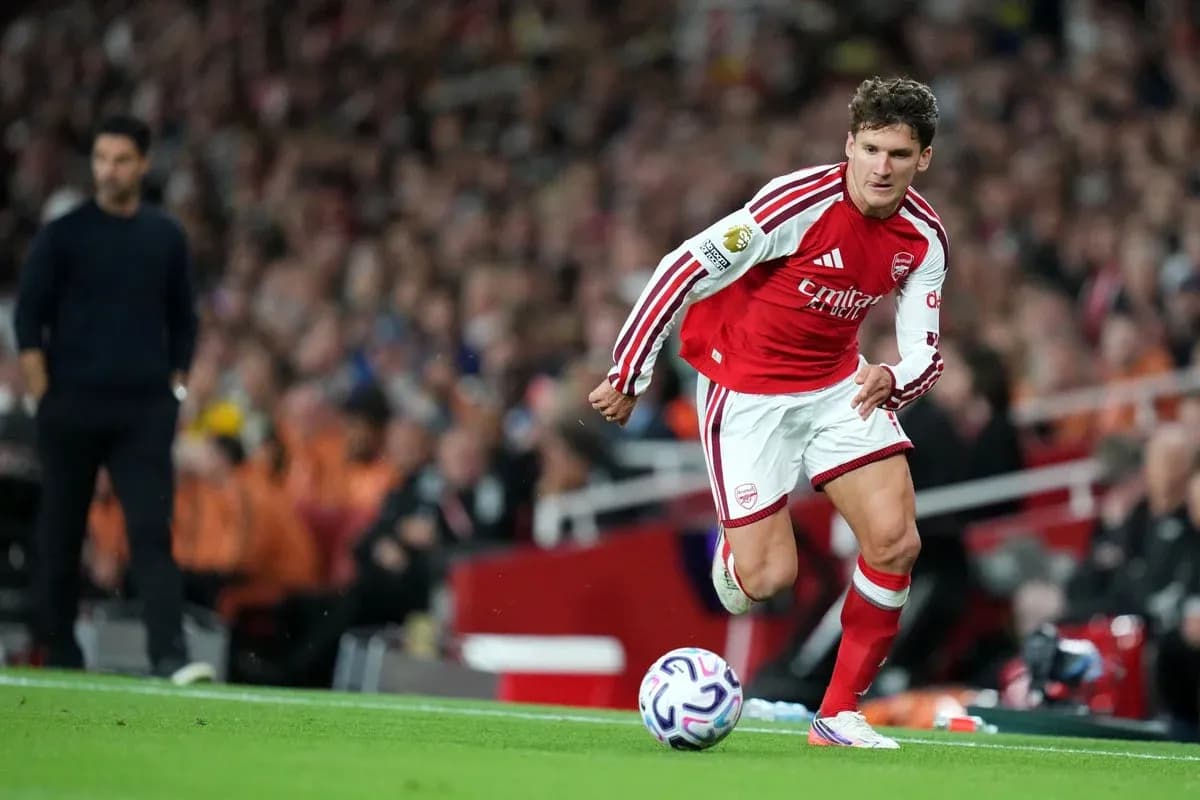 Arsenal player preparing to take a corner kick Arsenal player preparing to take a corner kick