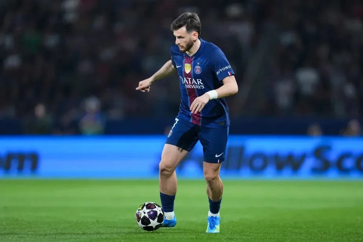 Player dribbling ball during PSG match Player dribbling ball during PSG match