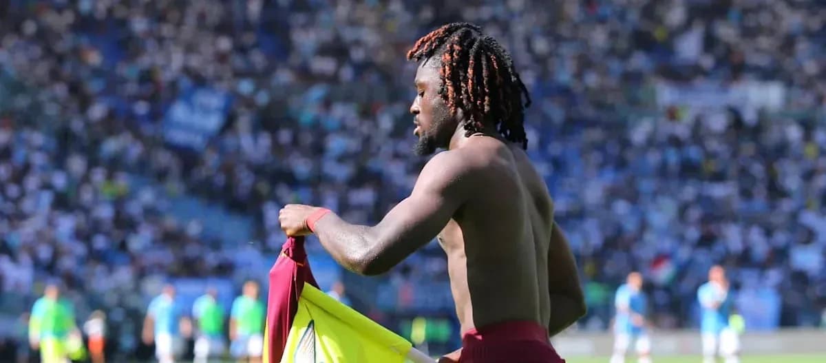 Player changing shirt during match at stadium Player changing shirt during match at stadium