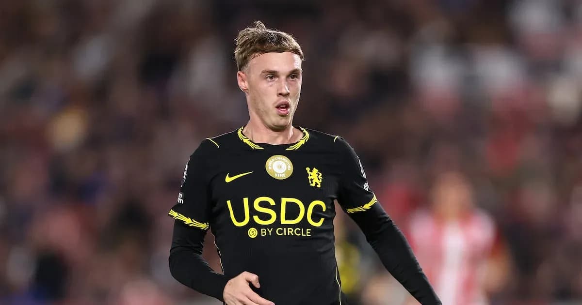 Player wearing black kit during a match Player wearing black kit during a match