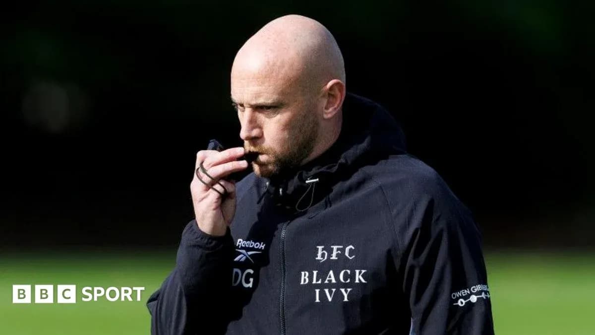 Coach with whistle during training session Coach with whistle during training session