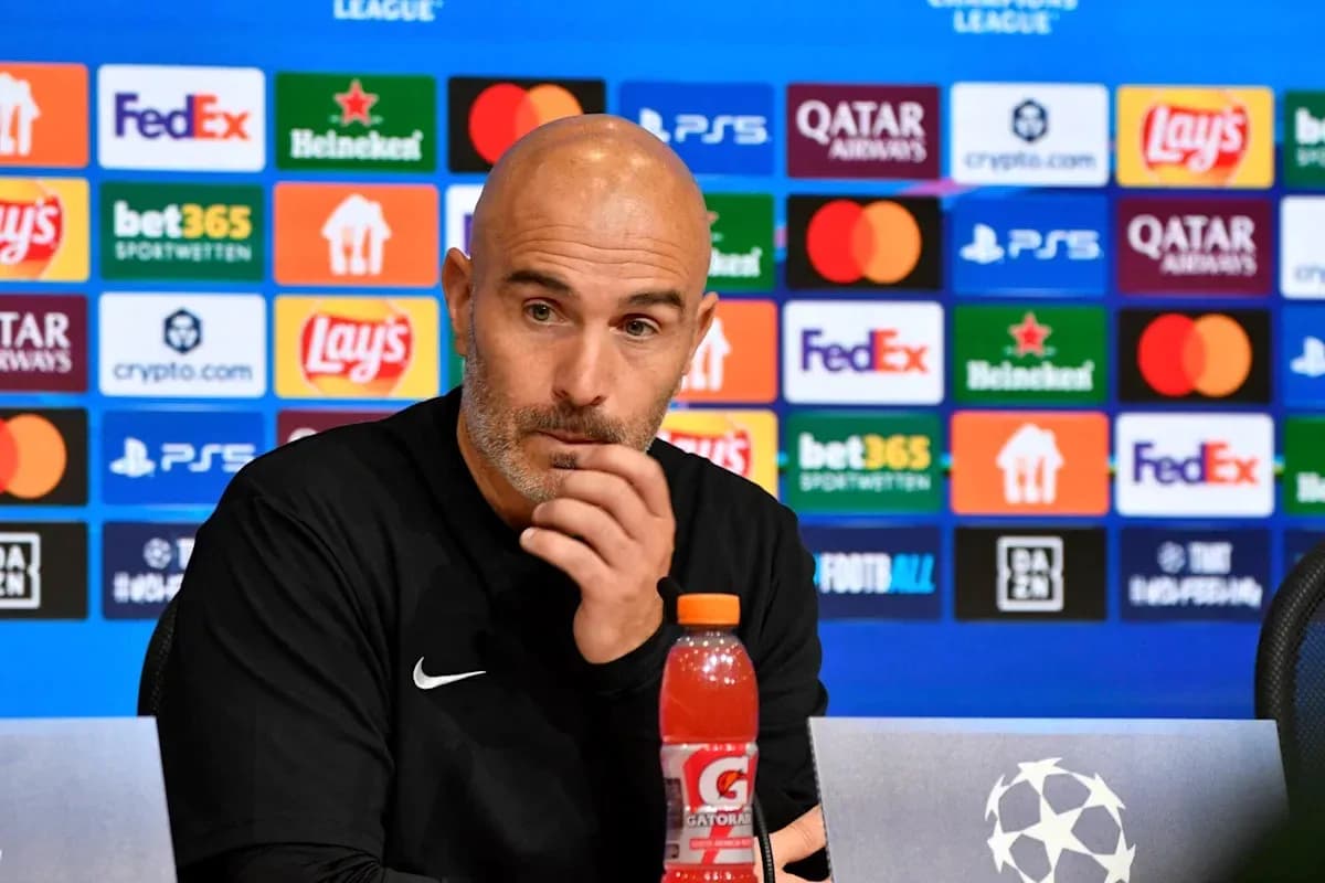 Coach speaking at UEFA Champions League press conference Coach speaking at UEFA Champions League press conference