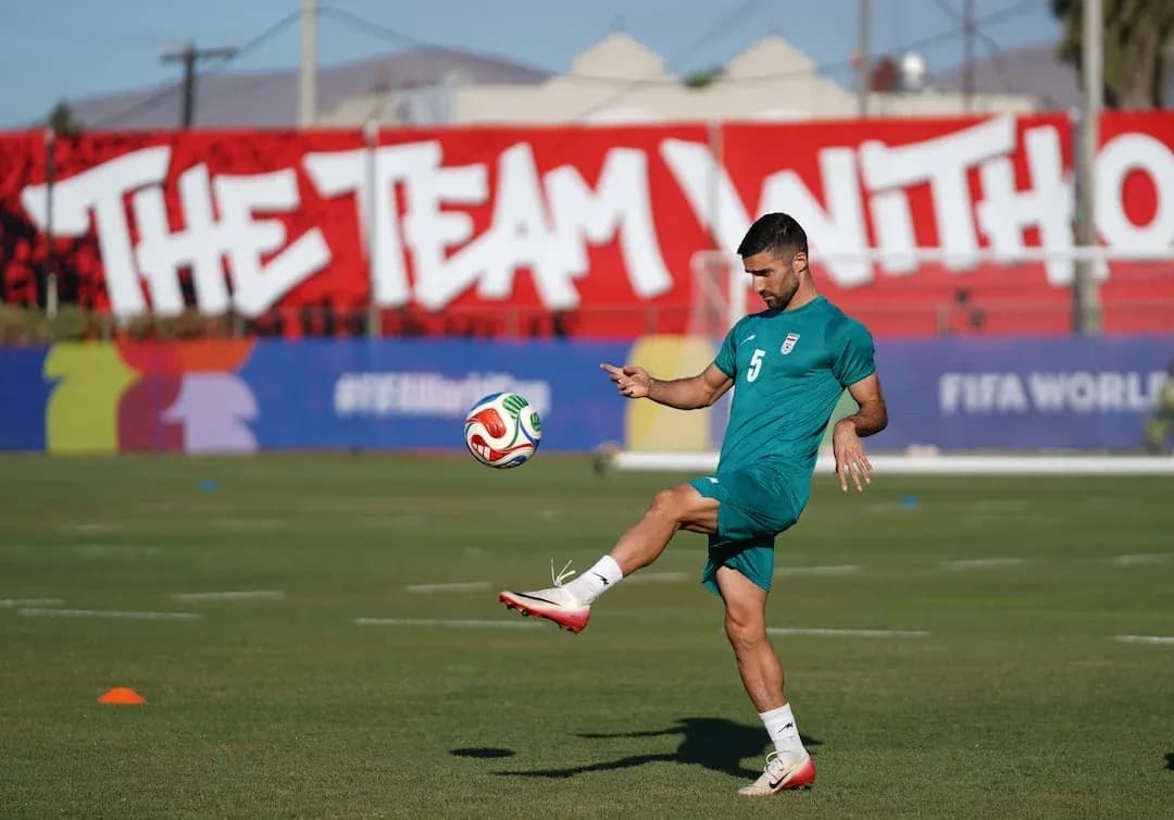 Iran player practicing with football before match Iran player practicing with football before match