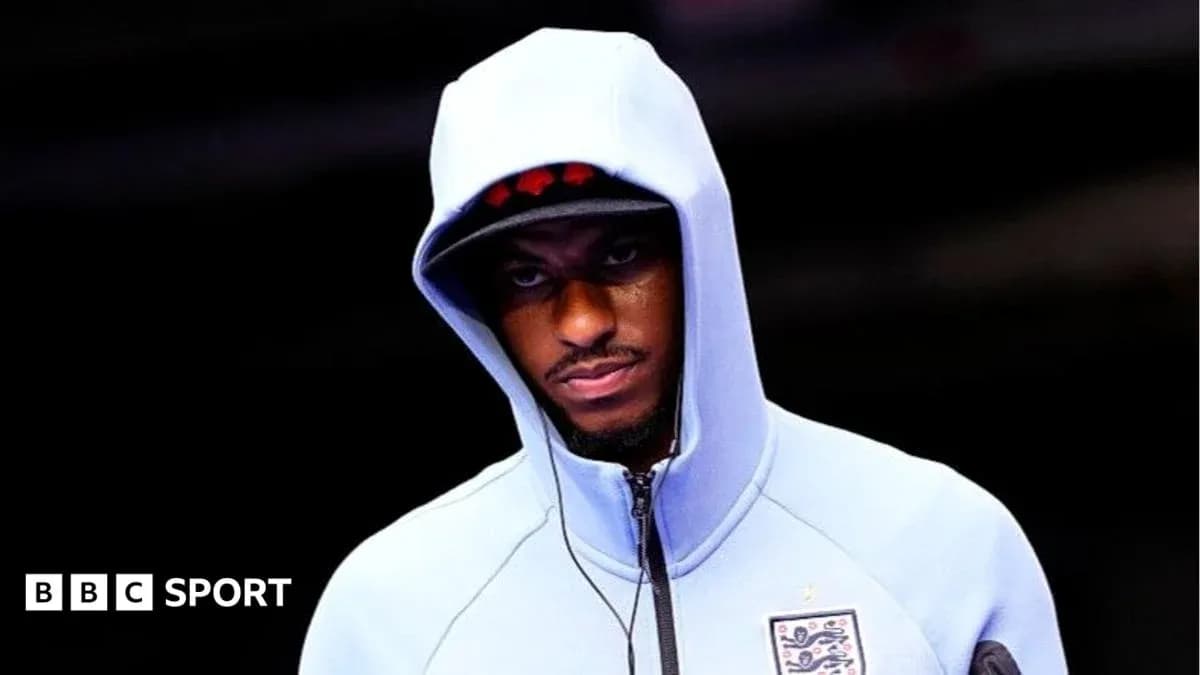 Player wearing a hooded sweatshirt before match Player wearing a hooded sweatshirt before match