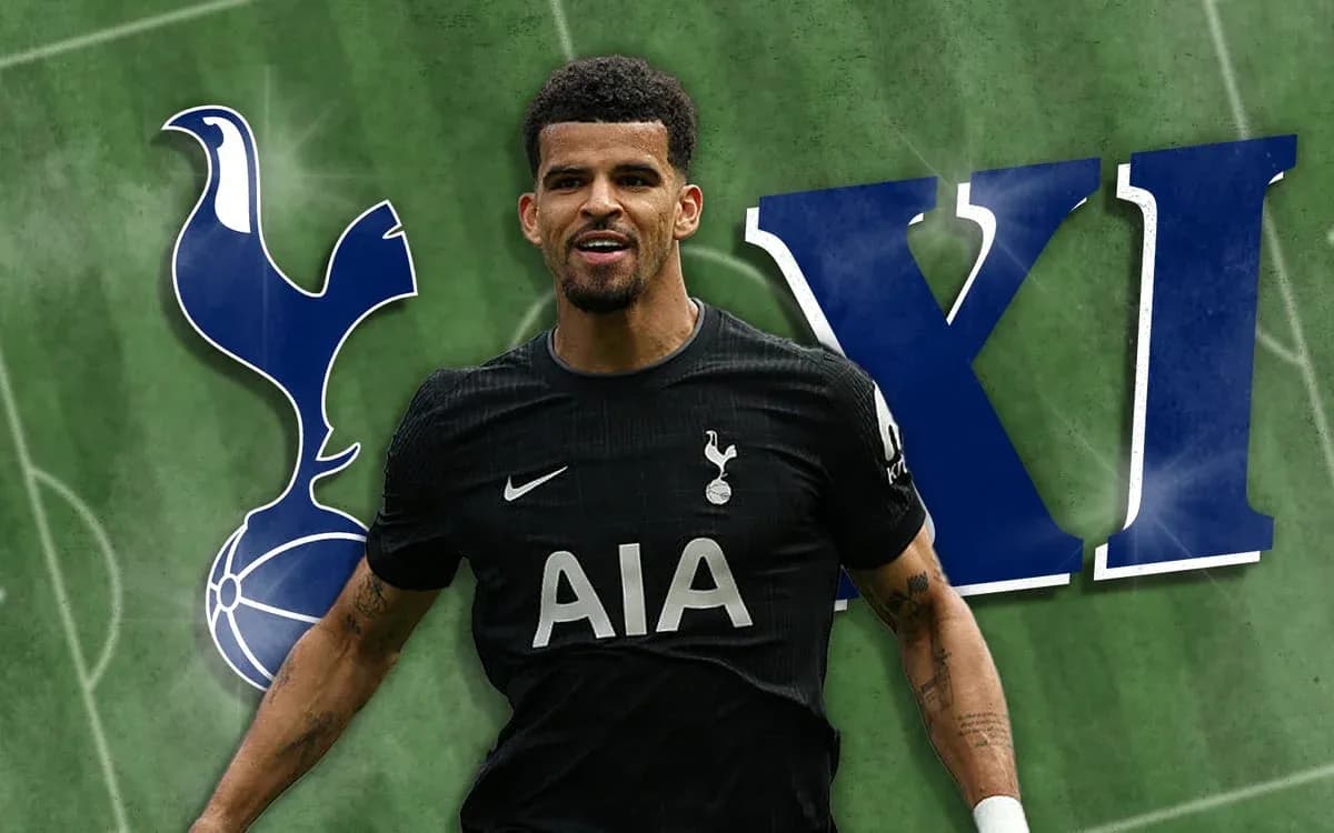 Player in Tottenham kit celebrating on the pitch Player in Tottenham kit celebrating on the pitch