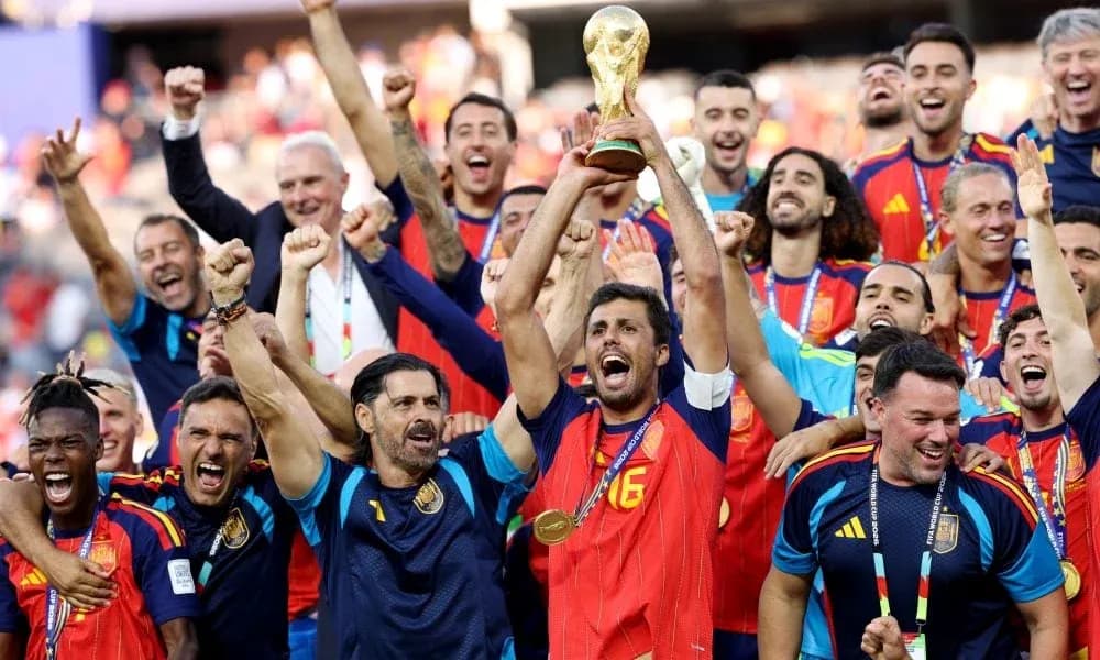 Spain team celebrating with World Cup trophy Spain team celebrating with World Cup trophy