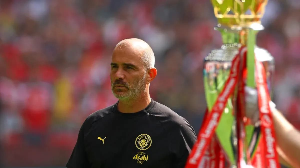 Manager walking past trophy before match Manager walking past trophy before match
