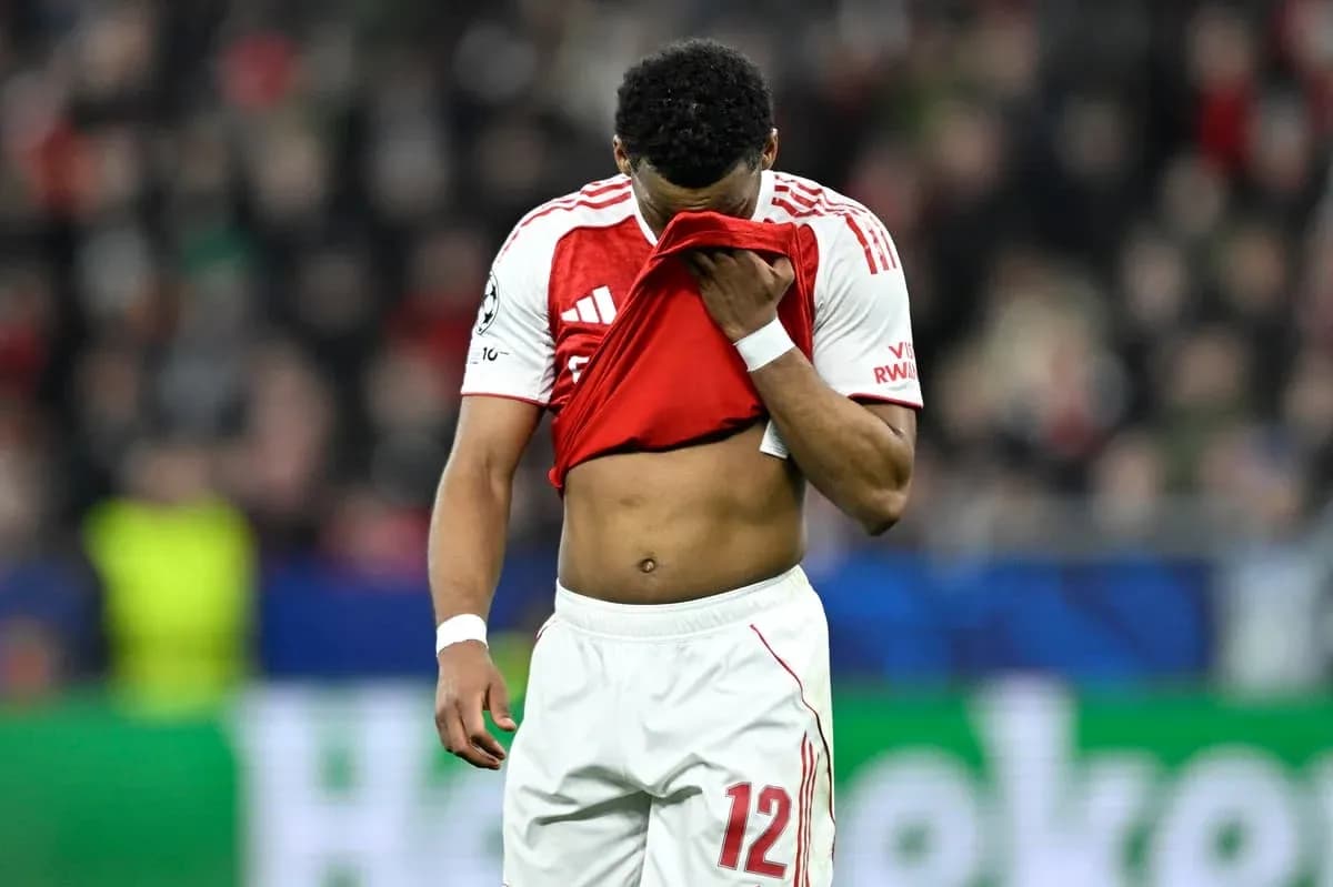 Player holding jersey to face after match Player holding jersey to face after match