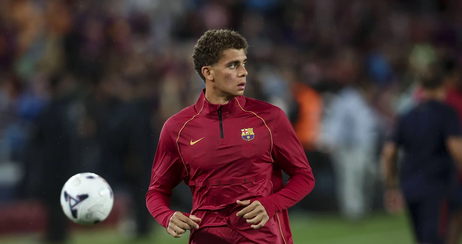 Player warming up in FC Barcelona training gear Player warming up in FC Barcelona training gear