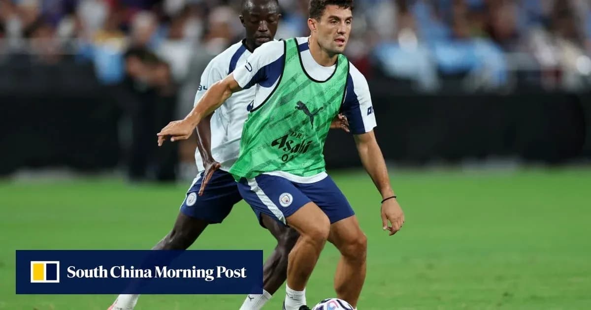 Two players training on the field with a ball Two players training on the field with a ball