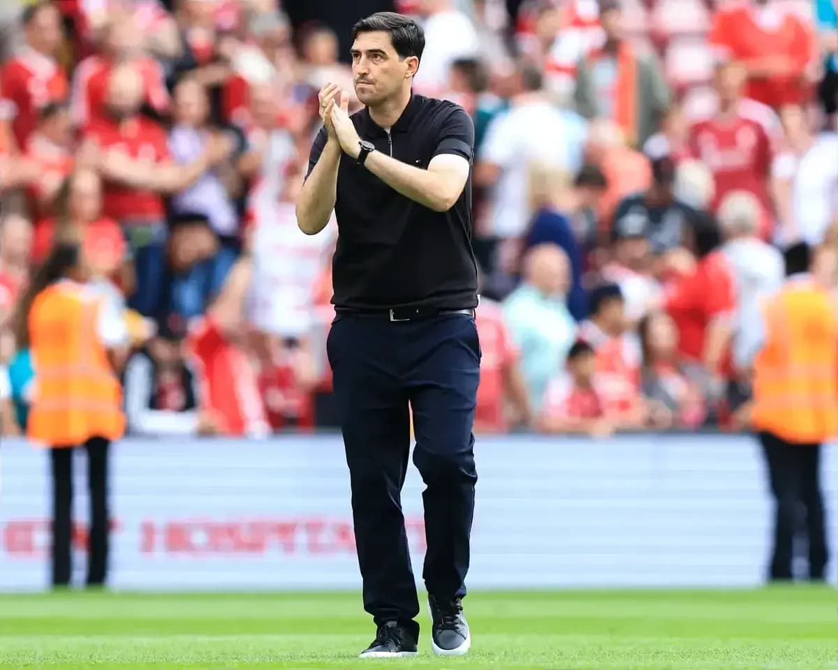 Manager applauding fans after the match Manager applauding fans after the match