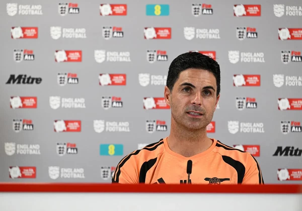 Manager speaking at press conference with England Football backdrop Manager speaking at press conference with England Football backdrop