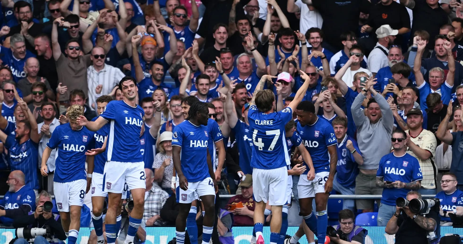 Ipswich players celebrating a goal with fans Ipswich players celebrating a goal with fans