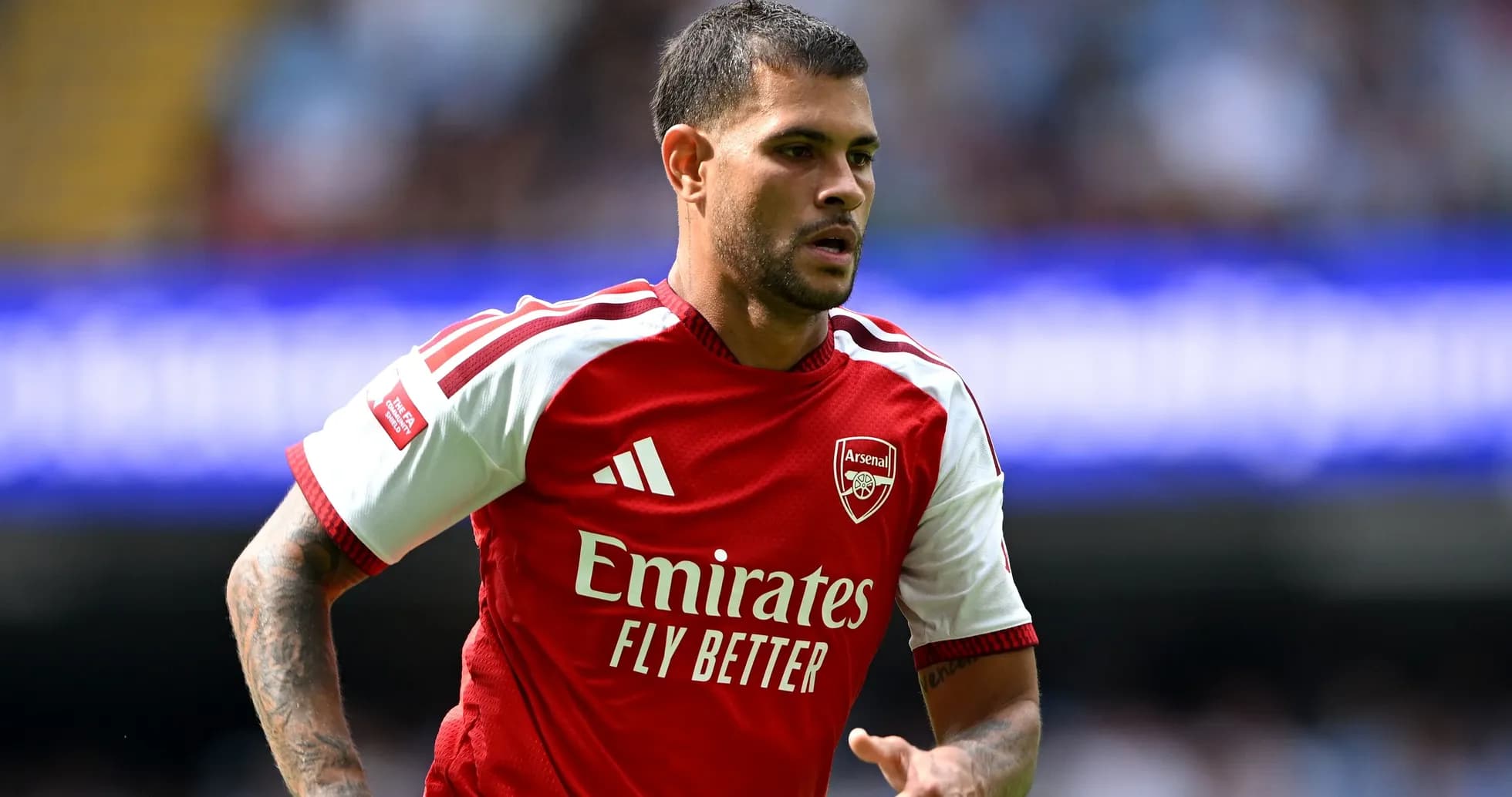 Player wearing Arsenal jersey during a match Player wearing Arsenal jersey during a match