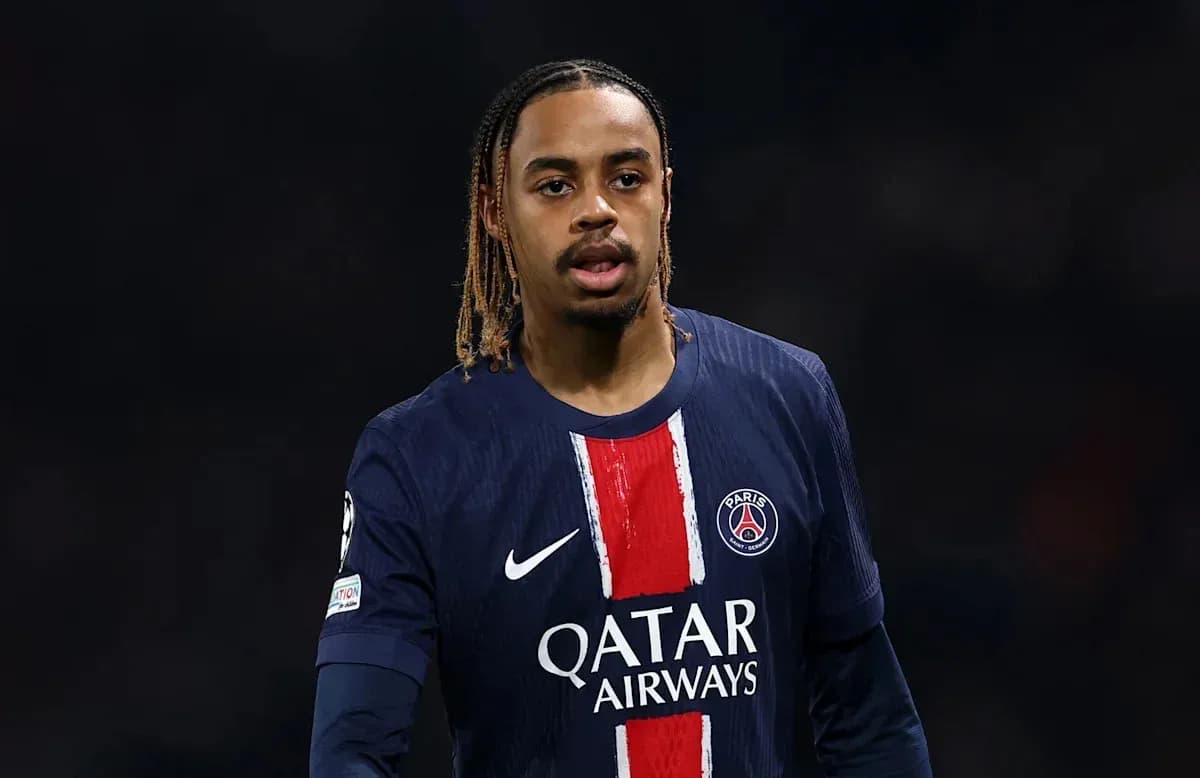Player in PSG jersey during a match Player in PSG jersey during a match