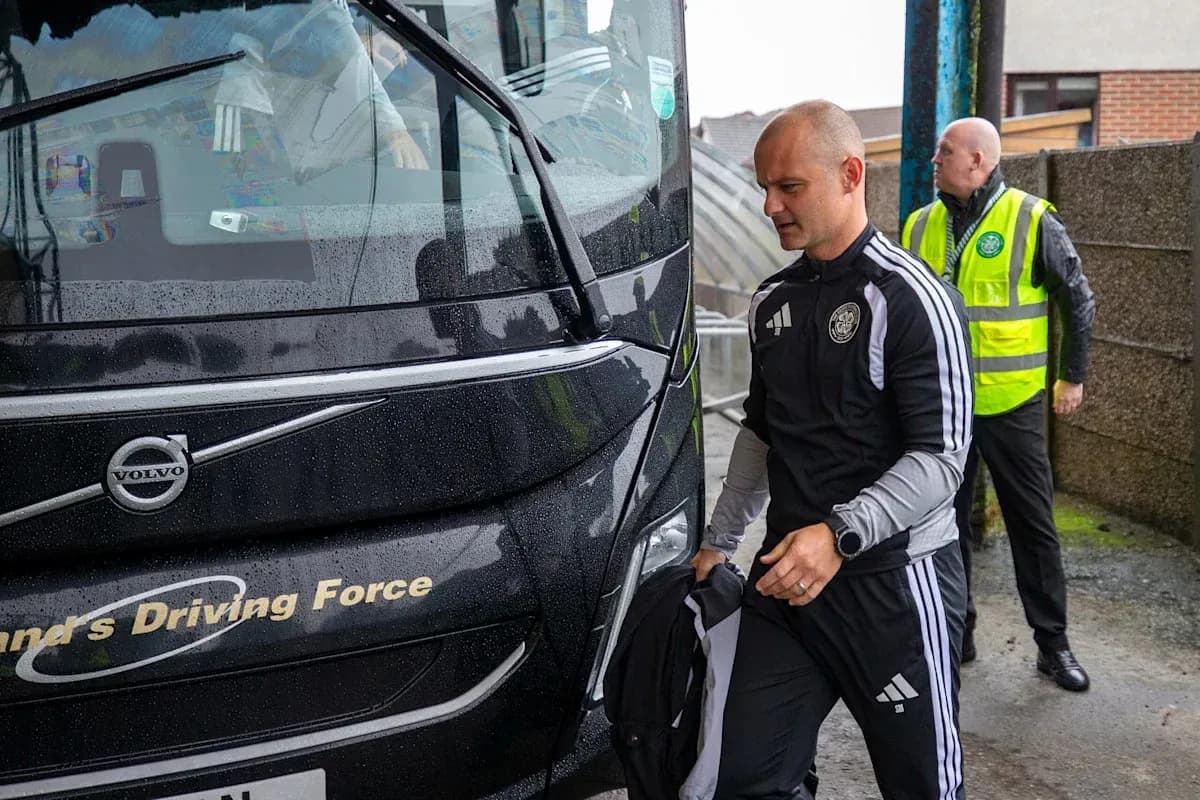 Coach arriving at venue in rainy weather Coach arriving at venue in rainy weather