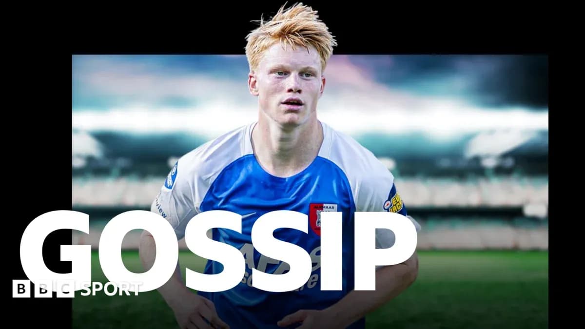Player in blue and white kit on football pitch Player in blue and white kit on football pitch