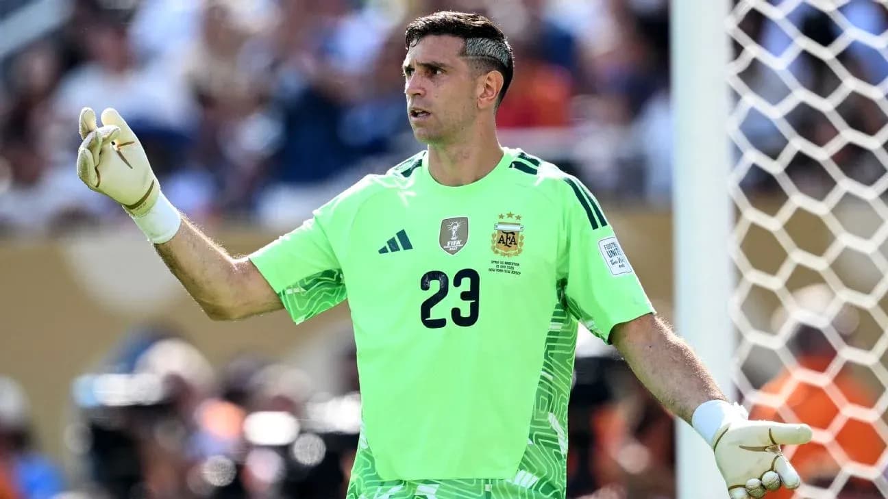 Goalkeeper signaling during a match in green kit Goalkeeper signaling during a match in green kit