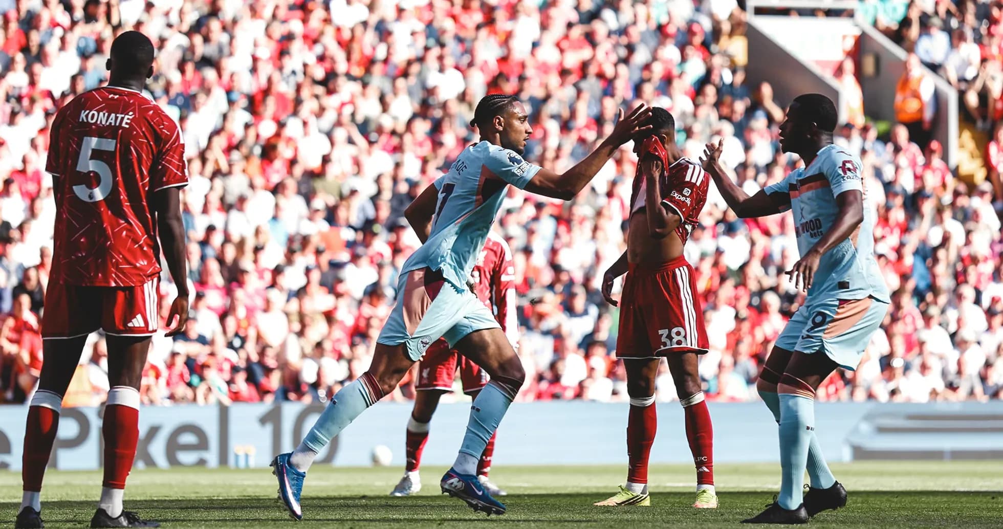 Players interacting during Liverpool vs Brentford match Players interacting during Liverpool vs Brentford match